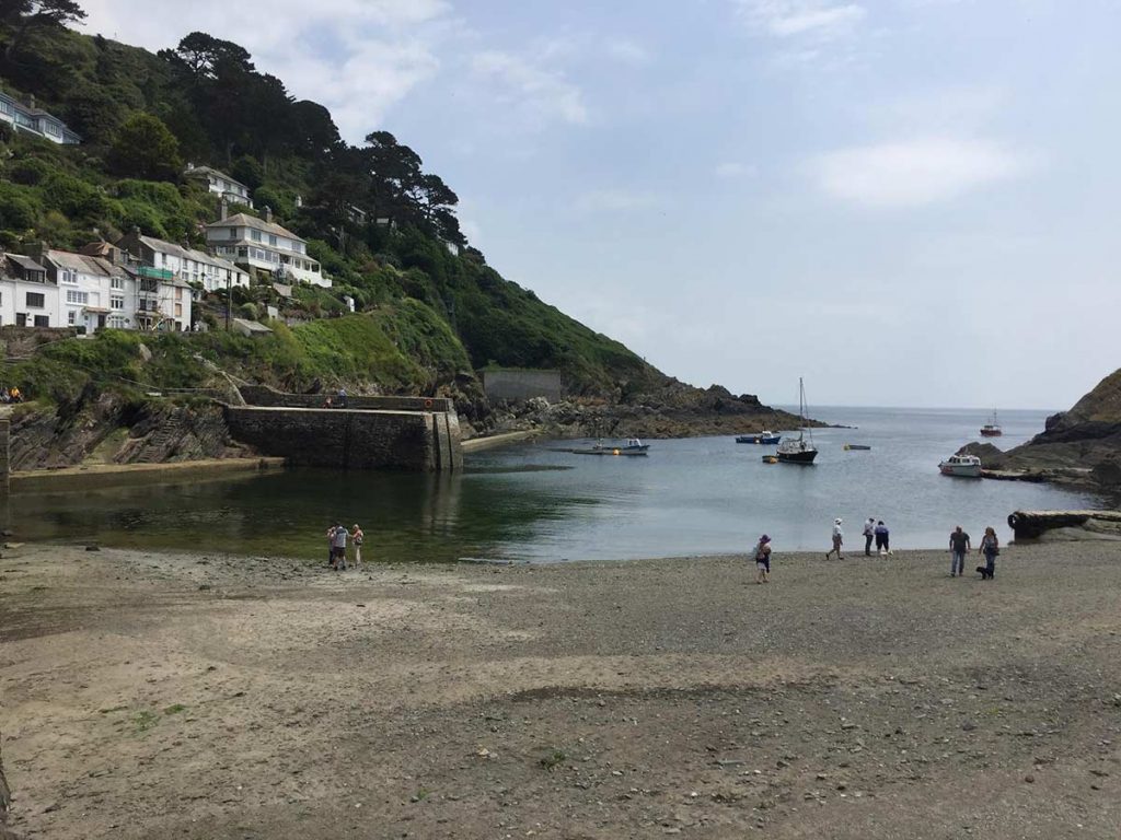 Blue skies and blue waters at the beach at Polperro