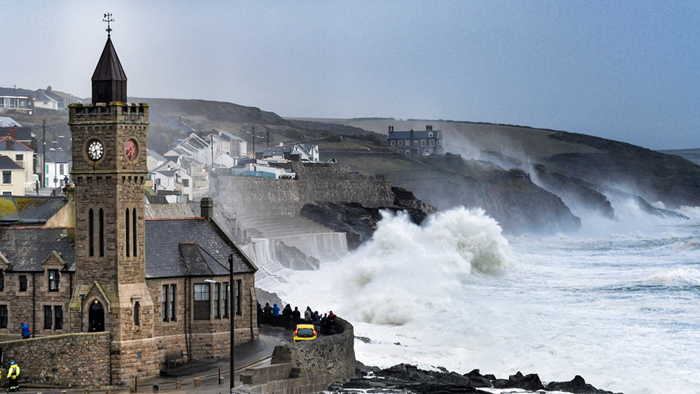 porthleven storm watching cornwall cornish harbour waves